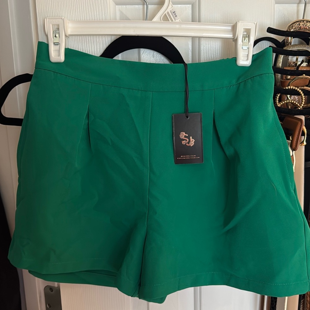 green high-waisted shorts